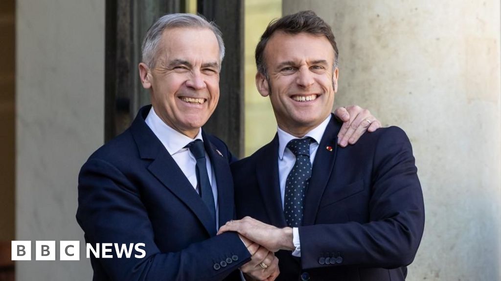 Carney meets Macron on first foreign visit as PM