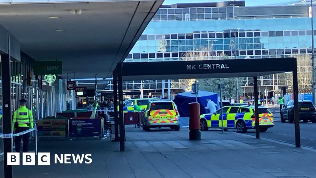 Armed police shoot man dead at railway station