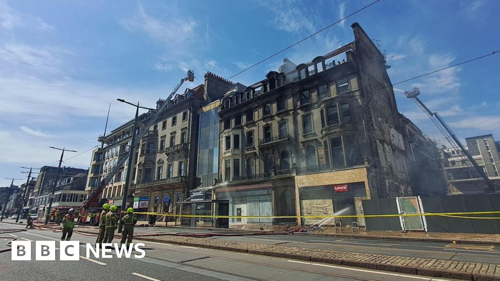 Police and fire investigation launched into former department store blaze