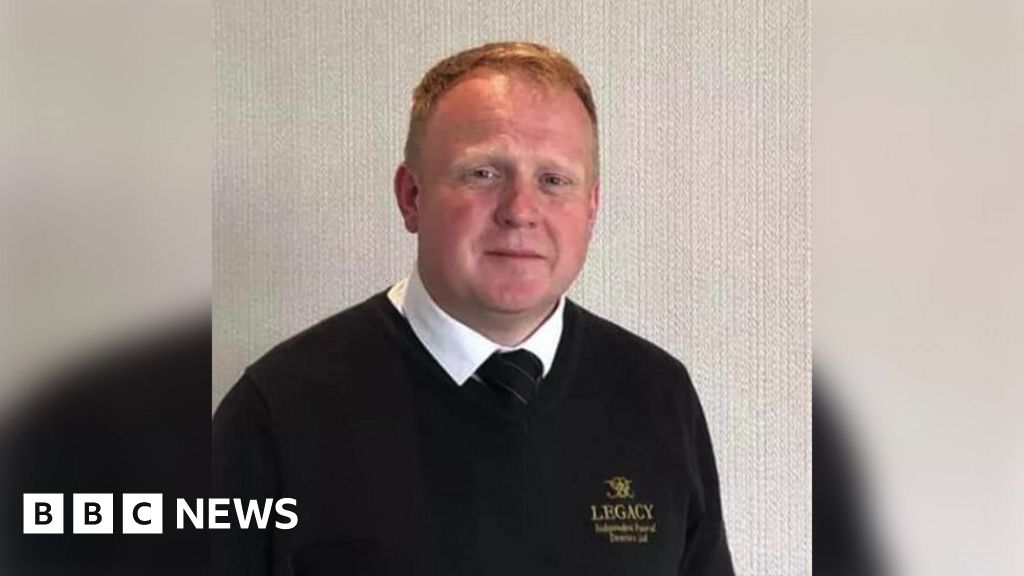Funeral director in court facing 63 charges