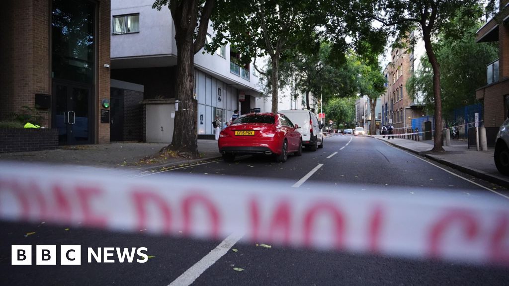 Two dead and two injured in attack at business