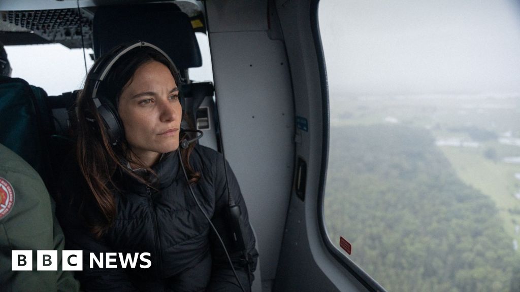 Brazil floods: On board a rescue helicopter