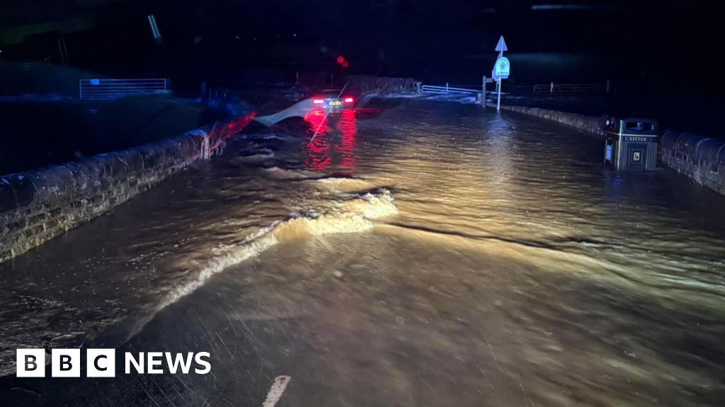 Travel chaos as heavy rain batters North West