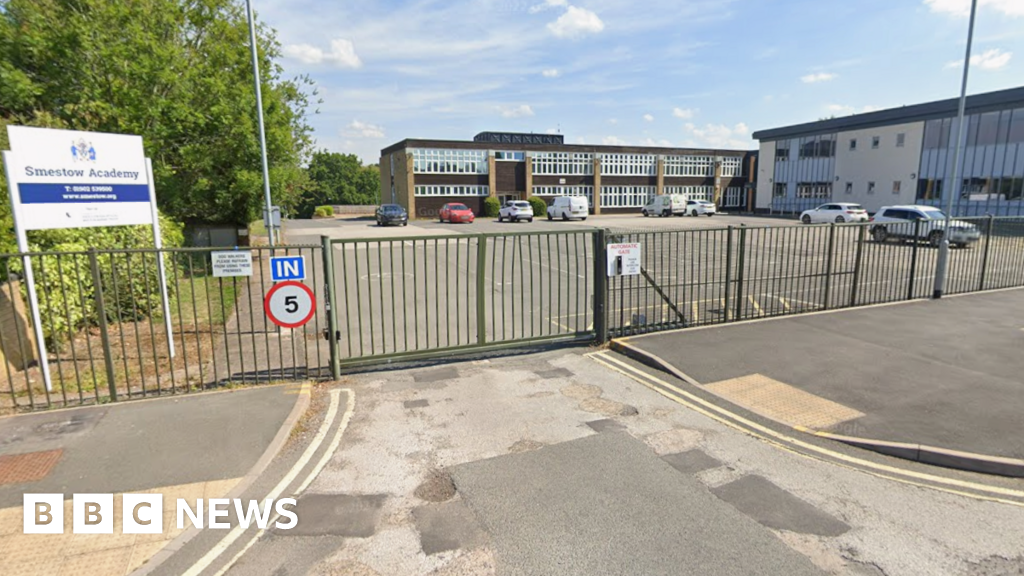School closes after man's body found in grounds