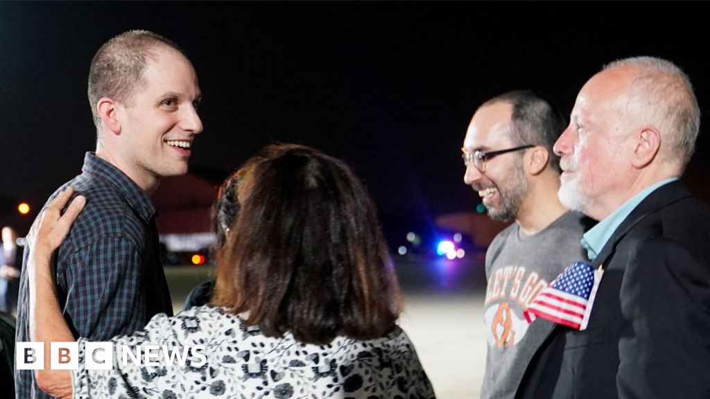 Americans freed in Russia prisoner swap land in US