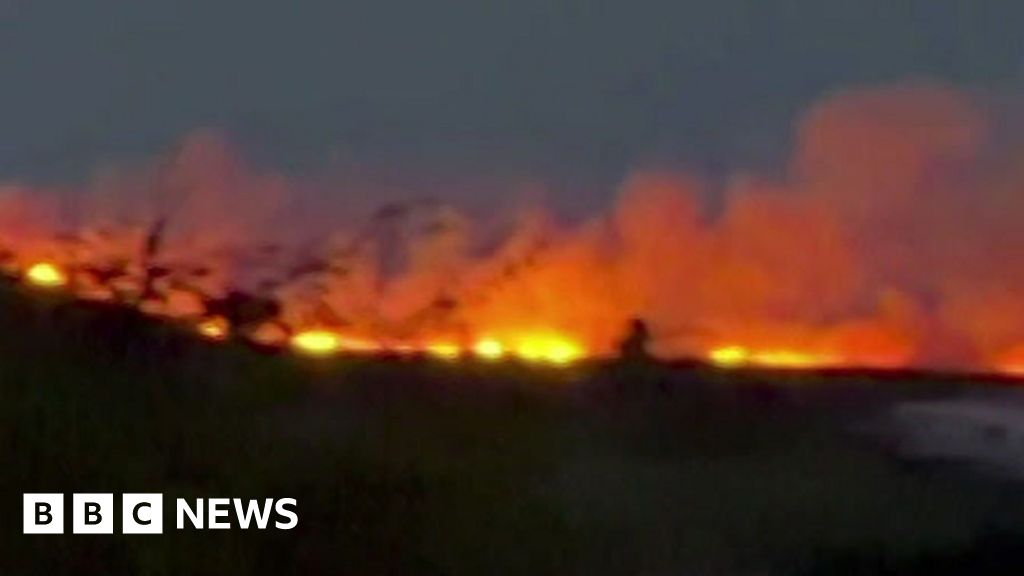 Smoke from mountain wildfire the size of 120 football pitches smelled 30 miles away