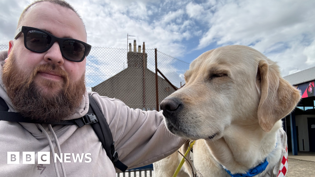 Football fan and guide dog are first to visit all Scottish league grounds