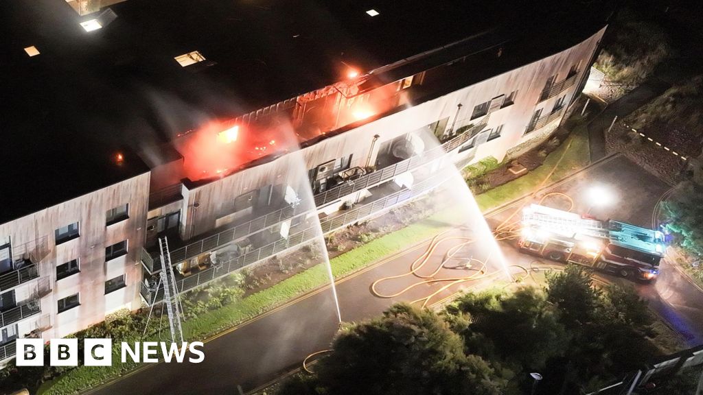 West Sussex: Man arrested after late-night fire at block of flats