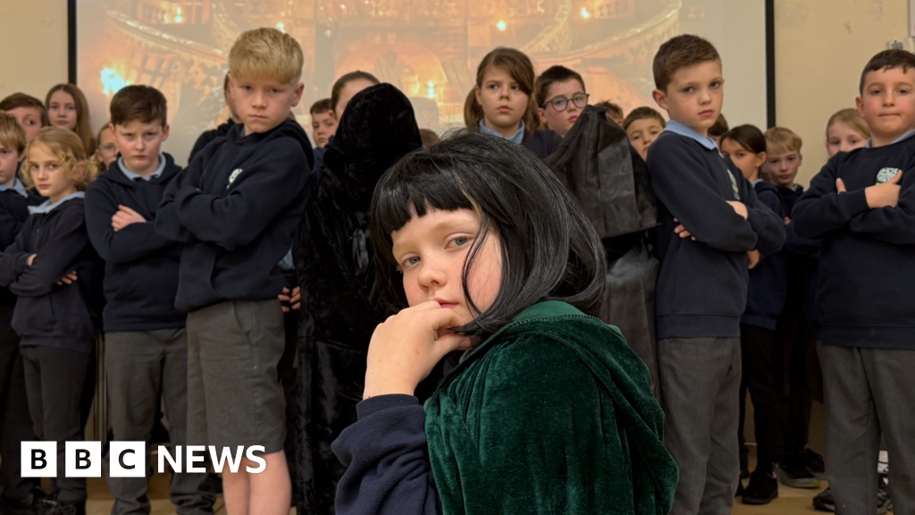 with cloaks and Claudia Winkleman wig