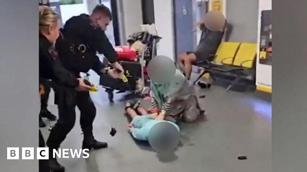 Second police officer under investigation over airport kick