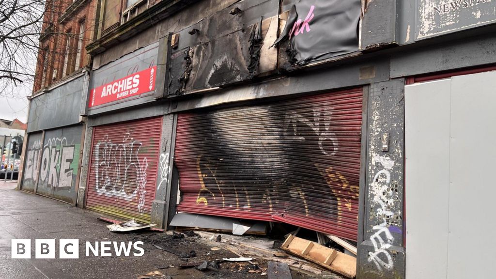 Belfast: Van driven into business and set alight in arson attack