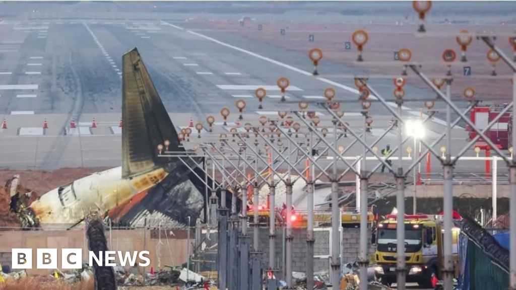 Why was there a wall near the runway?