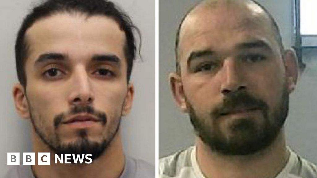 Police hunt for two men mistakenly released from prison