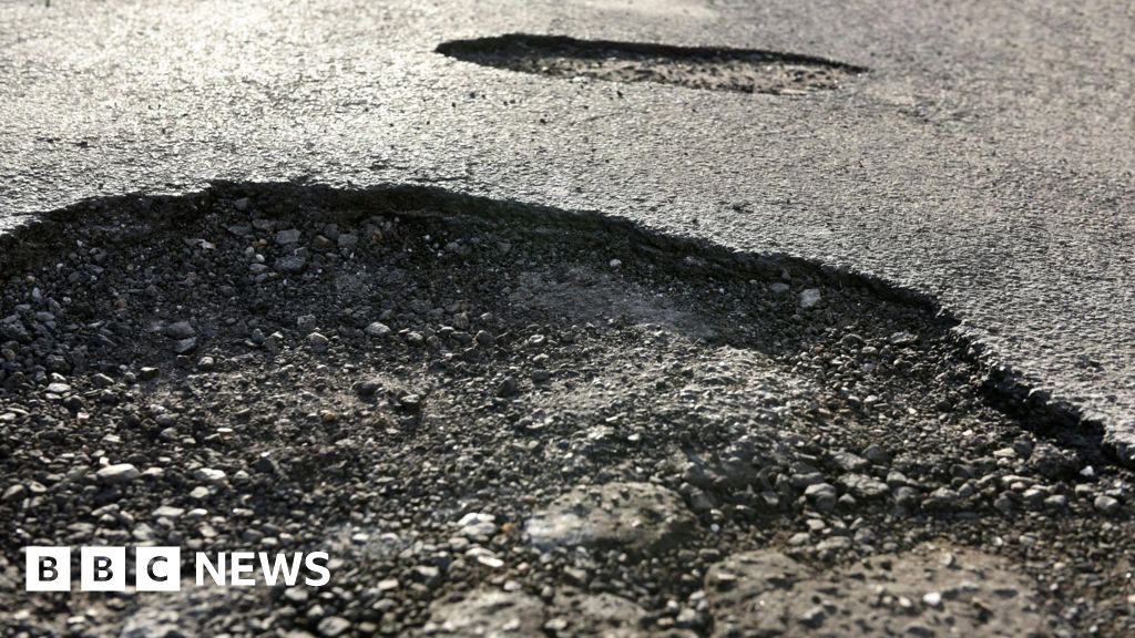 Sort pothole plague or lose cash,  councils warned