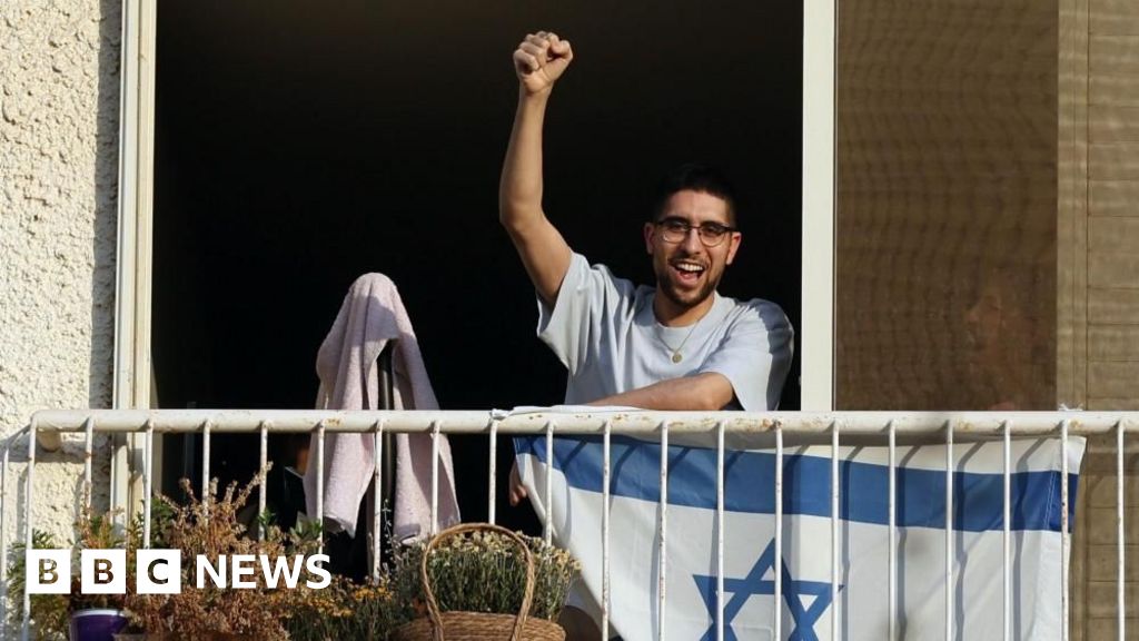 Freed Israeli hostage forced to dig own grave is 'growing back to his old self', father says