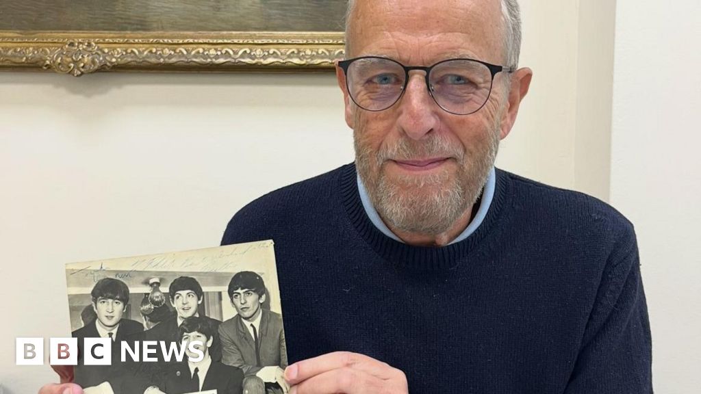 Signed photo of all four Beatles goes under hammer in Lichfield