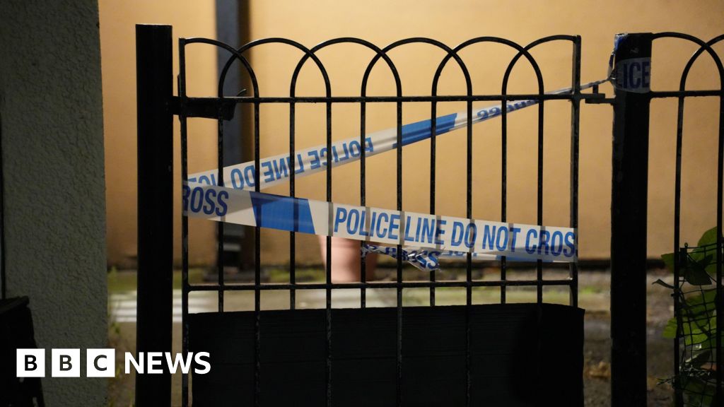 Police tape sealing off a gate at the scene of the attack in Stratford