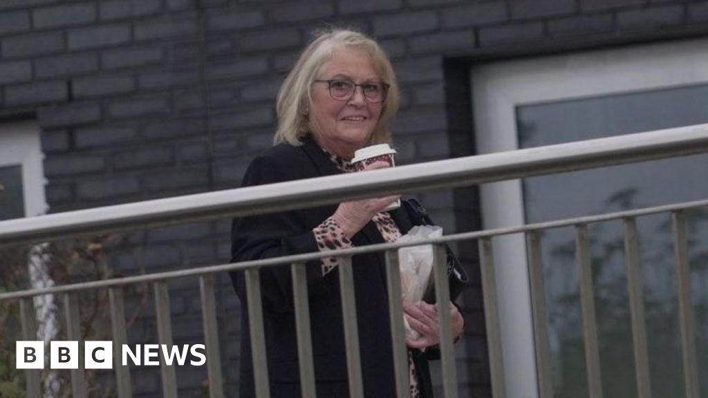 Nurse punched neighbour and forced her way into her home in row over parking