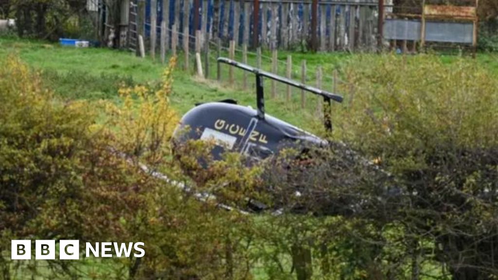 Man dies and three injured in helicopter crash
