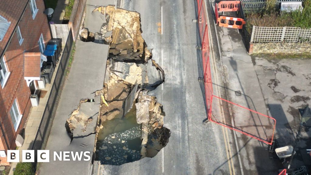 Major incident declared after large sinkhole appears outside houses