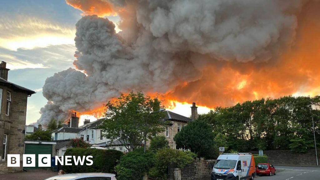 Huge plume of smoke as firefighters tackle industrial site blaze