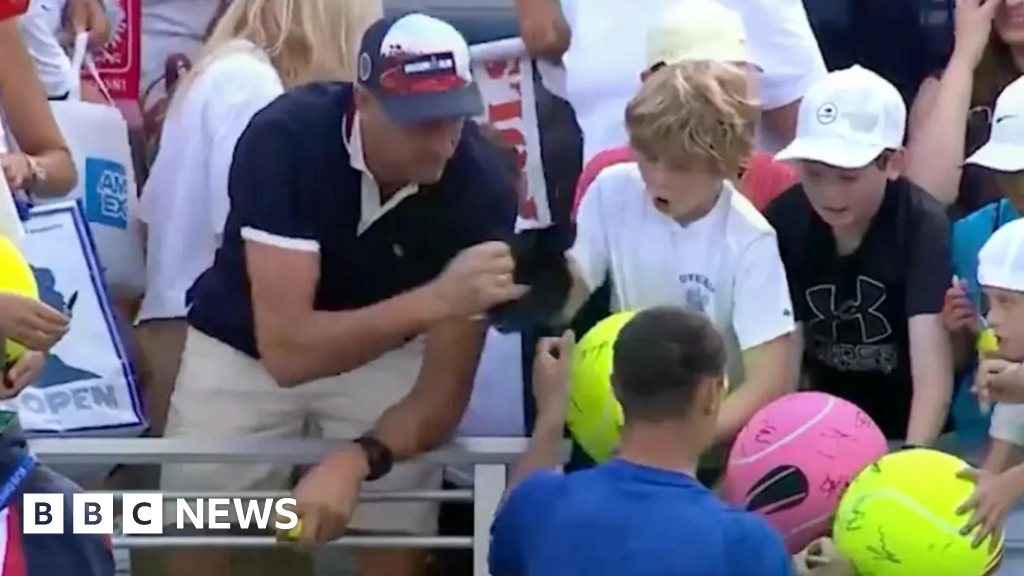 Main image of the article describing CEO who snatched boy's hat at US Open says he made 'huge mistake'