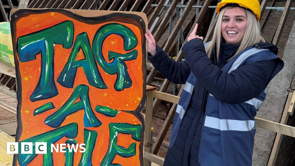 Painted tiles laid as part of Kettering Library repairs