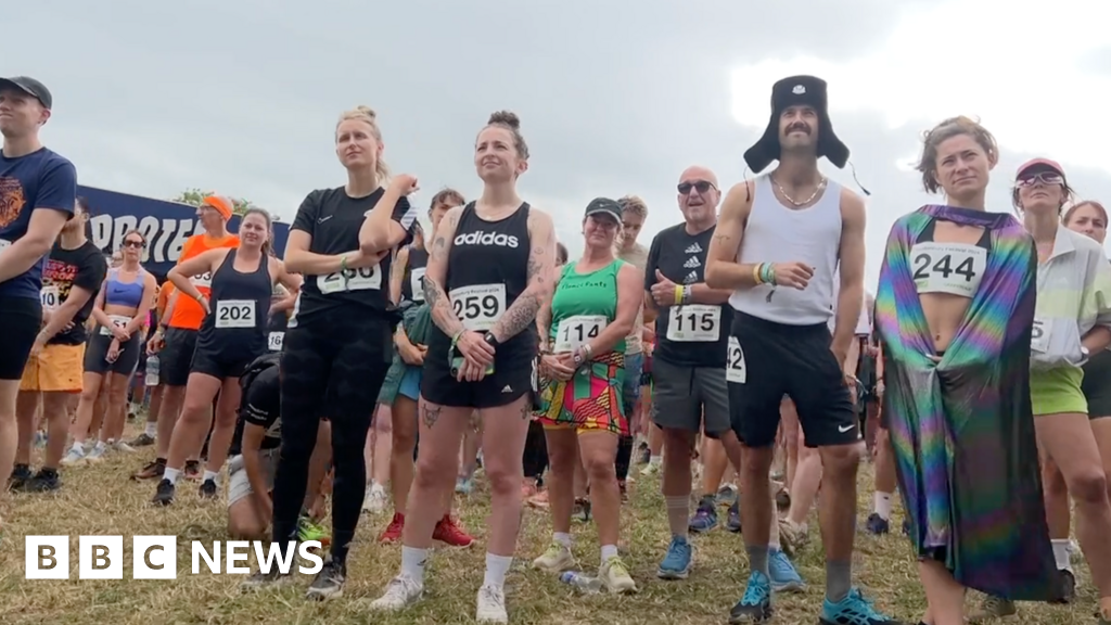 Glastonbury Festival ravers run around Worthy Farm