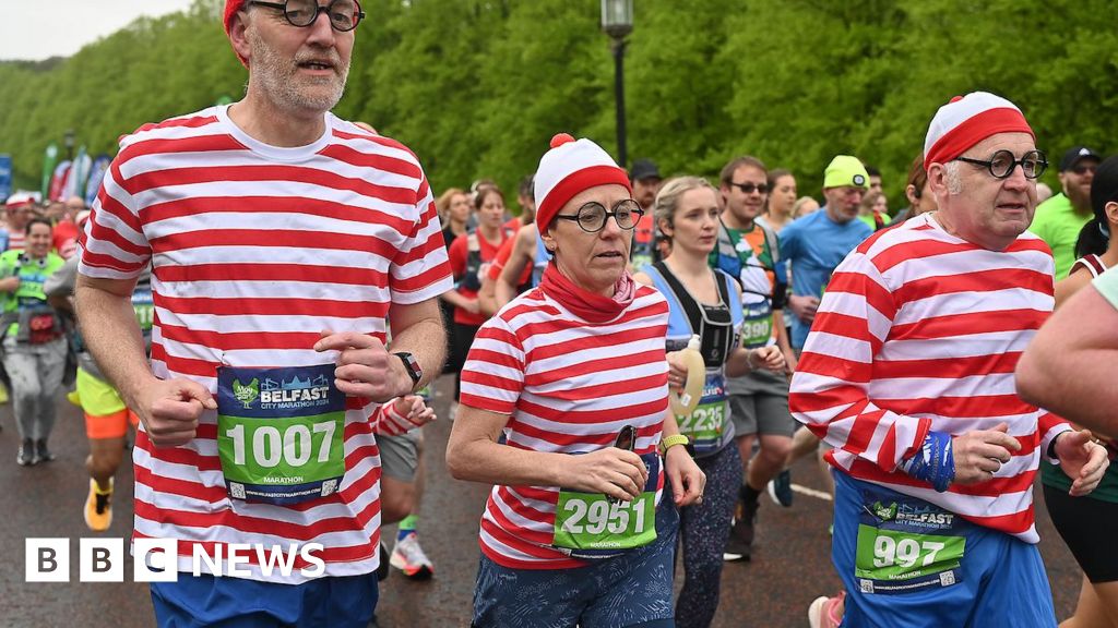 Runners dressed as Where's Wally run