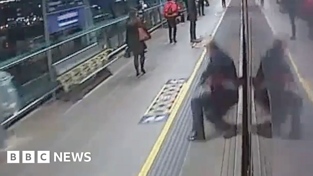 Man clipped by train pulling into railway station