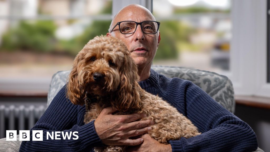 Richard Freedman with his cockapoo, Chester