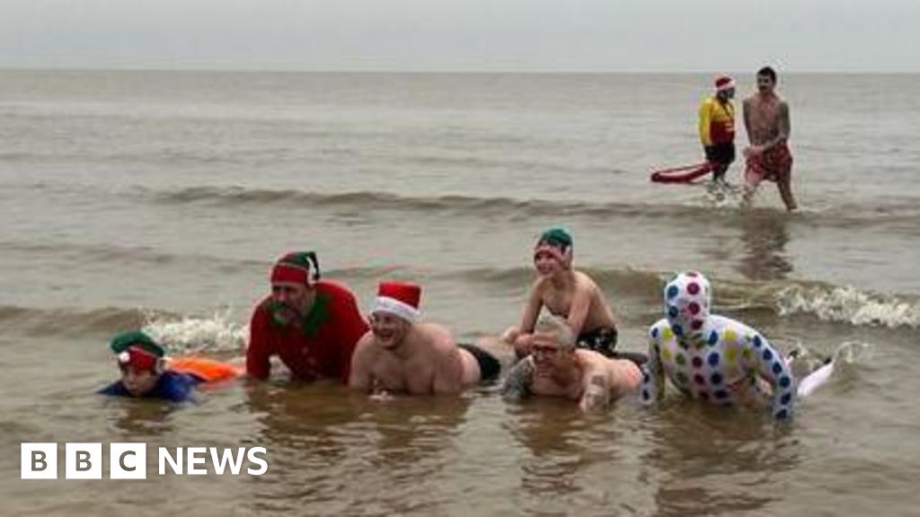 Hundreds of swimmers take Christmas Day North Sea dip