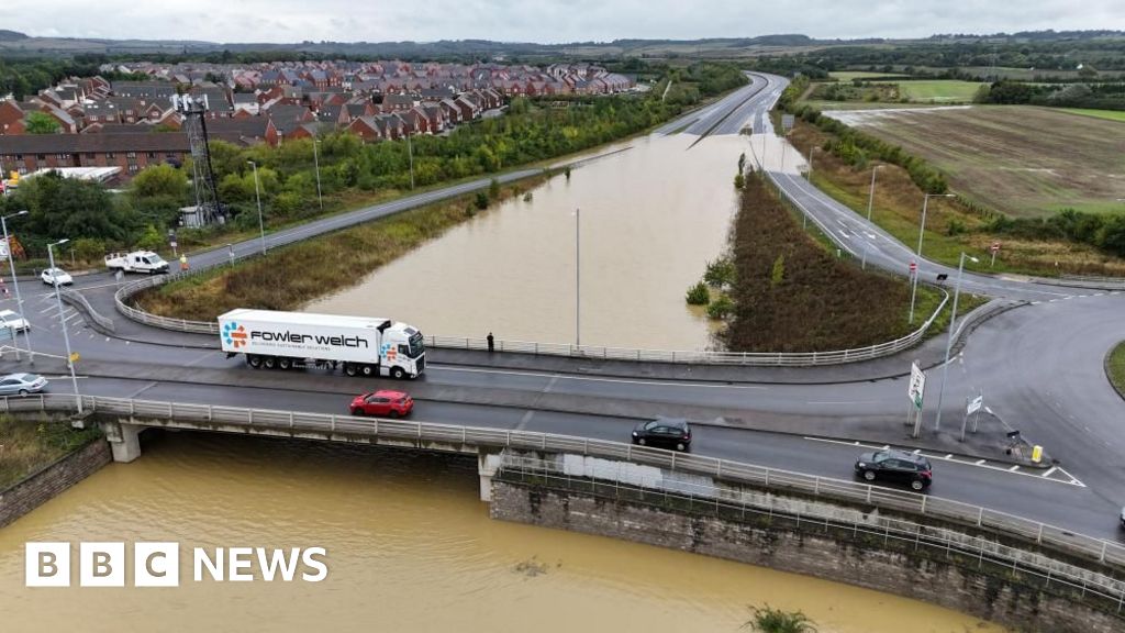 Flash floods and heavy rain batter England and Wales