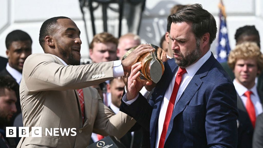 Watch: JD Vance drops college football trophy at White House