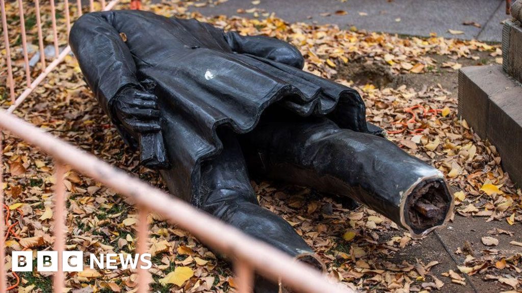 A severed statue divides an Australian city