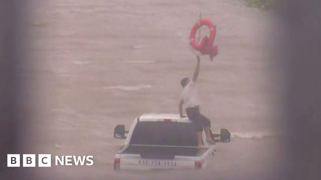 Watch fire engine rescue man from Beryl floods in Texas