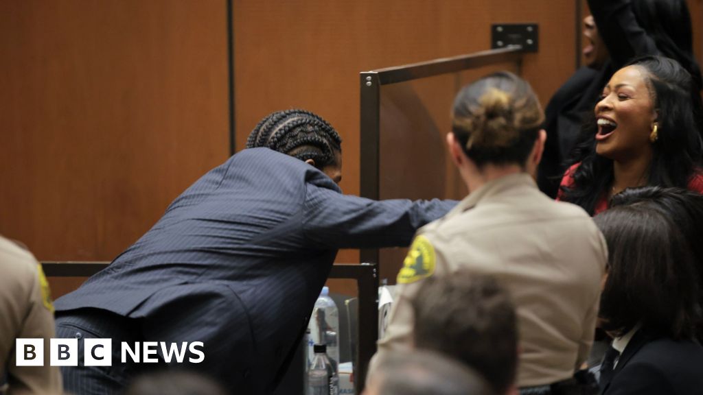 Watch: A$AP Rocky leaps over court barrier to hug Rihanna after not guilty verdict