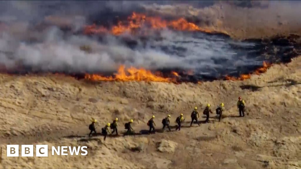 Wildfires burn at least 15,000 acres in California