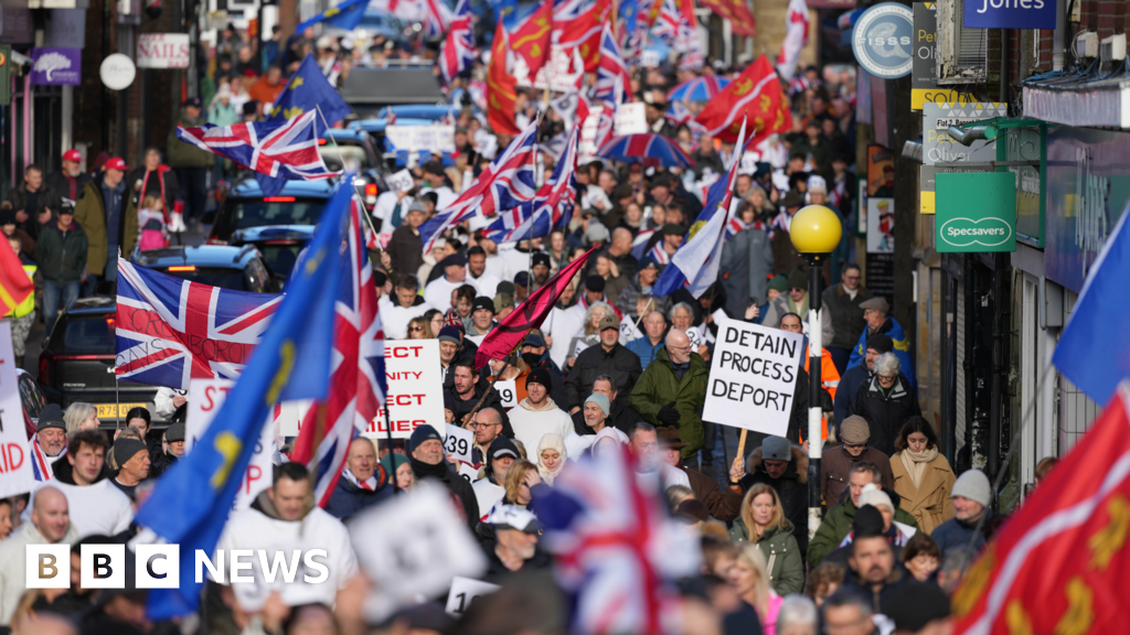 Protesters march over barracks asylum seeker plan