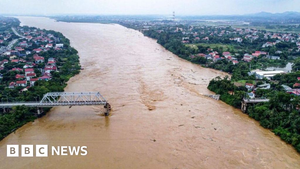 Cars plunge into river as super typhoon destroys Vietnam bridge