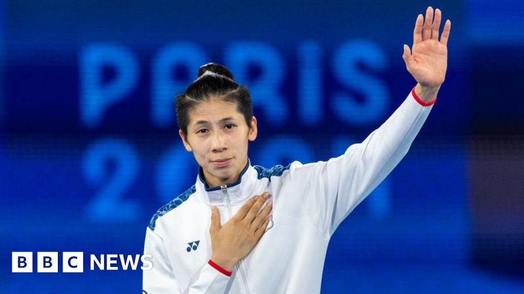 Taiwan cheers boxer who won Olympic gold after gender row