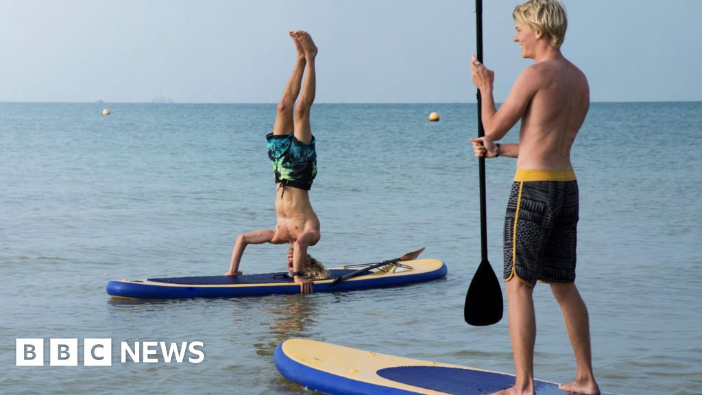 Four paddleboarders rescued amid holiday warning