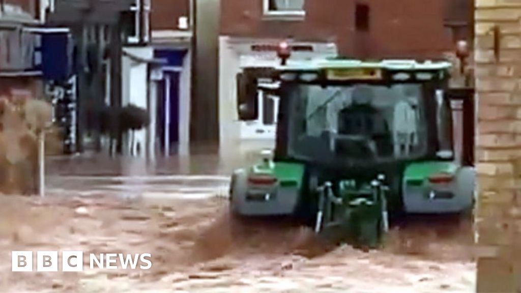 Onlookers shocked as tractor driven through floodwaters in Worcester town