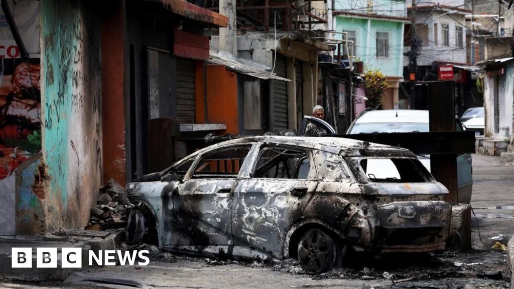 At least 64 killed in Rio's largest police raid on gangs