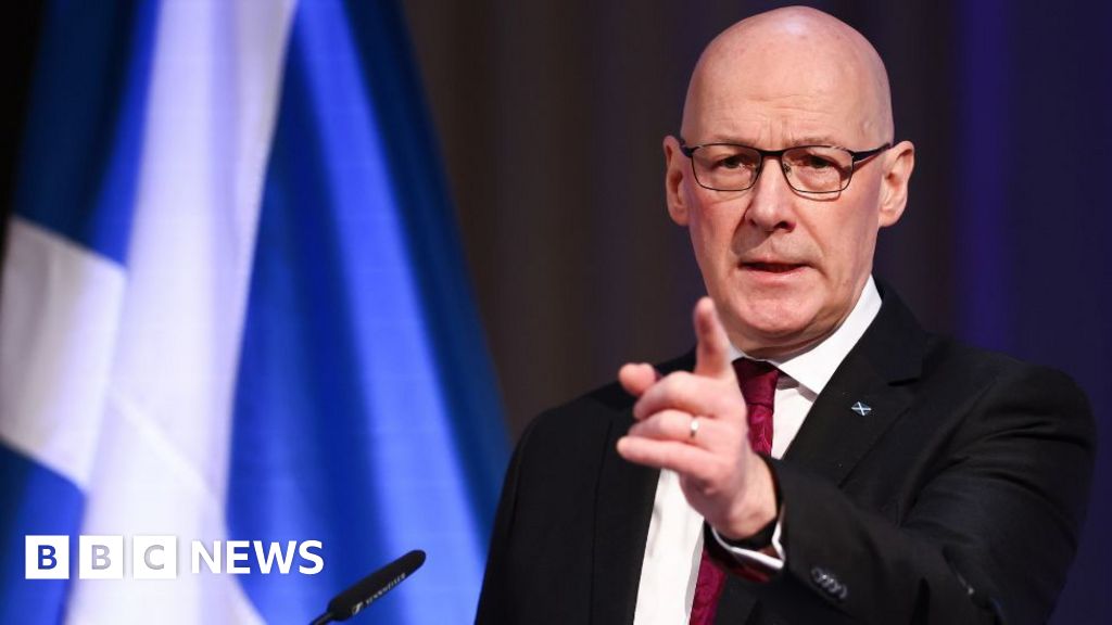 John Swinney denies SNP holding up two-child benefit cap payment