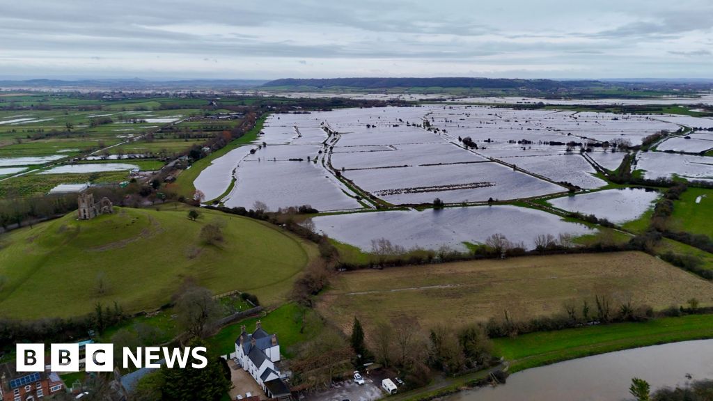 Flooding shuts schools and causes travel disruption