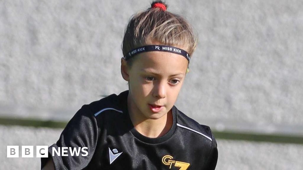 Girl, 10, killed by car on pitch wanted to be pro football player