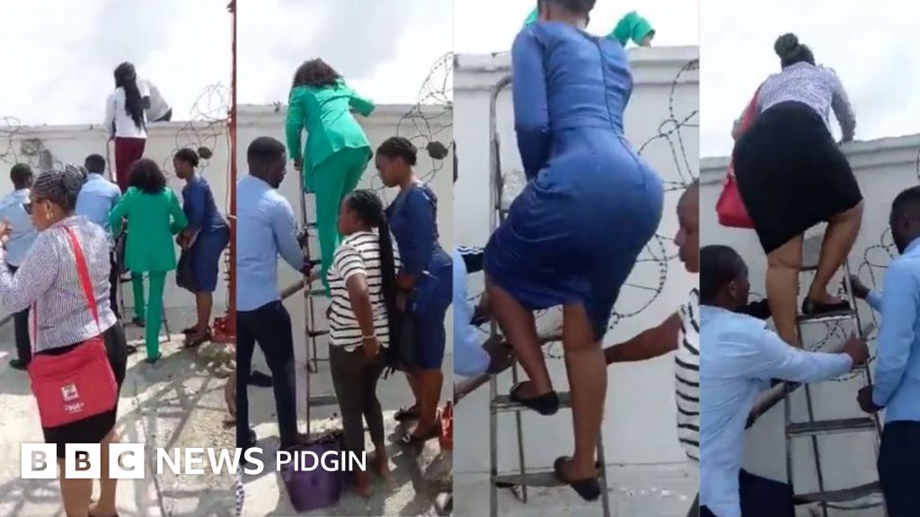 New naira note Drama as bank staff jump back fence run leave customers