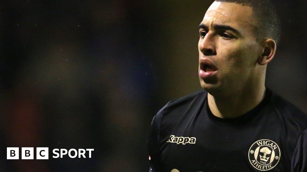 Portsmouth wigan s james vaughan and birmingham s viv solomon otabor