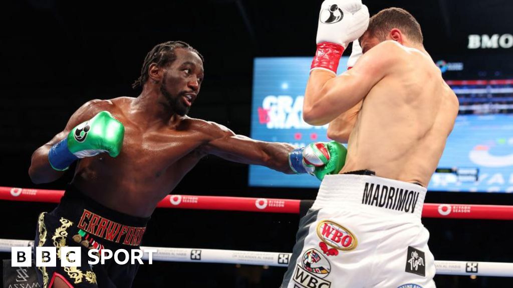 Crawford beats Madrimov to become four-weight world champion